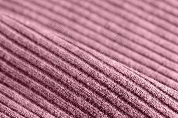 粉红色的针织品质地关-在上面.纺织品背景