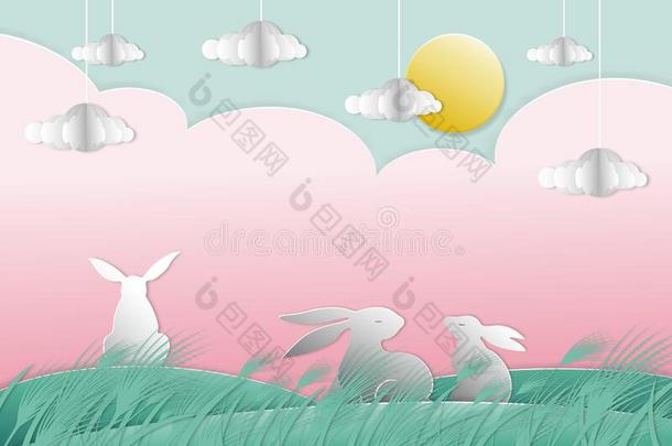 幸福的复活节卡片和兔子,太阳,云向粉红色的天背景.
