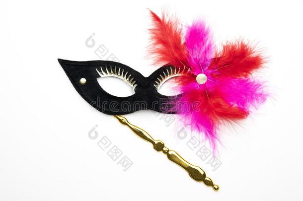 黑的节日的狂欢节面具和紫色的,粉红色的,羽毛