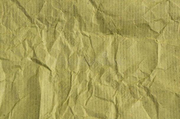 背景关于绿色的平原纸摺皱的特写镜头