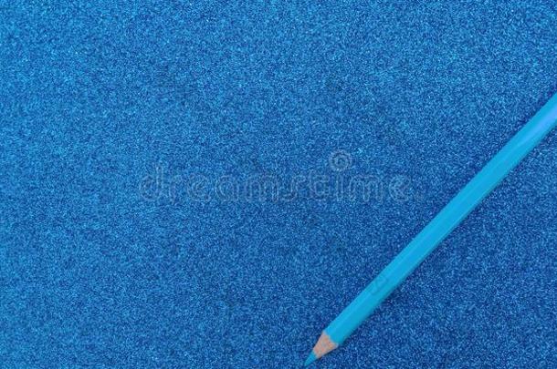 蓝色织地粗糙的背景和闪烁影响和铅笔后台