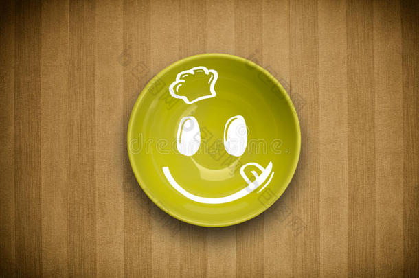 幸福的微笑的漫画面容向富有色彩的盘盘子