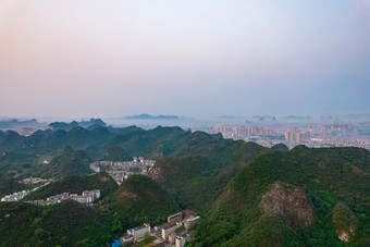 广西柳州城市日出彩霞迷雾航拍摄影图