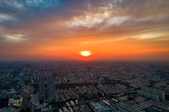 城市日落晚霞夕阳航拍摄影图山东济宁