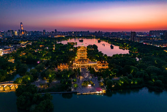 济南大明湖日落晚霞夜景航拍摄影图