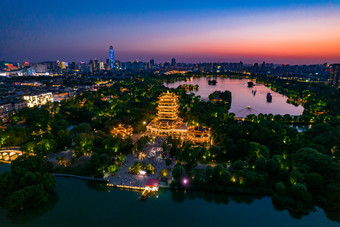 济南大明湖日落晚霞夜景航拍摄影图