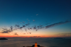 海边日落晚霞蓬莱八仙过海夜景航拍摄影图