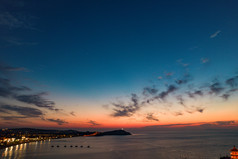 海边日落晚霞蓬莱八仙过海夜景航拍摄影图