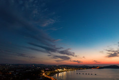 海边日落晚霞蓬莱八仙过海夜景航拍摄影图