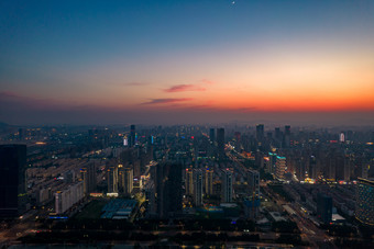 山东日照城市夜幕降临夜景灯光晚霞航拍摄影图