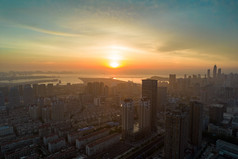 山东烟台城市清晨日出彩霞航拍摄影图