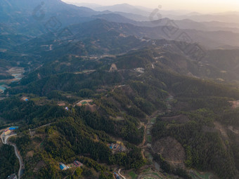 连绵起伏山川日落晚霞航拍摄影图