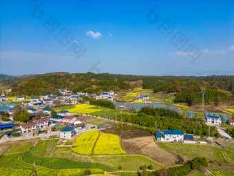 丘陵山川农田油菜花美丽乡村航拍摄影图