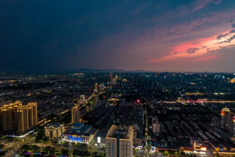 山东淄博城市晚霞夜幕降临航拍摄影图