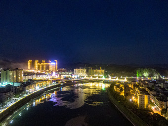 少数民族风雨桥特色建筑夜景灯光航拍摄影图