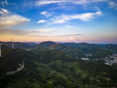 夕阳晚霞山川风车发电航拍摄影图