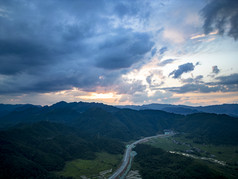 夕阳晚霞山川蓝天航拍摄影图