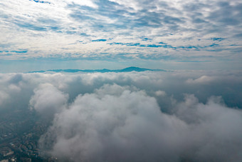 云层之上云海城市航拍摄影图