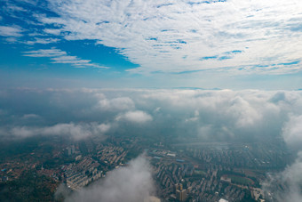 云层之上<strong>云海</strong>城市航拍摄影图