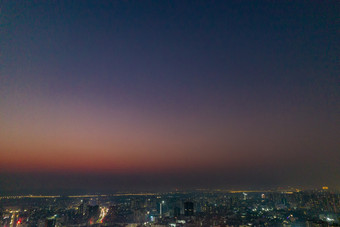 广东湛江夜幕降临夜景灯光彩霞航拍摄影图