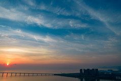广东珠海港珠澳大桥日出彩霞航拍摄影图
