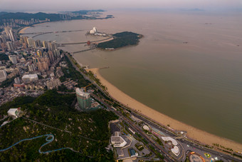 珠海海边大海晚霞城市晚霞航拍摄影图