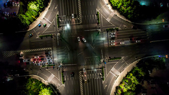 城市十字交叉<strong>路口</strong>交通车辆行驶夜景航拍摄影图