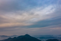 大山云雾缭绕日出航拍摄影图
