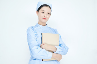 身穿护士服手拿医用iPad的年轻护士
