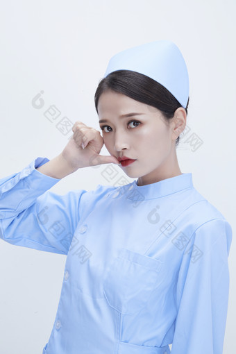 身穿蓝色护士服展示各种<strong>表情</strong>的漂亮女护士