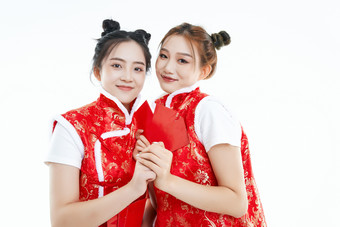 白色<strong>背景</strong>下身穿<strong>喜庆</strong>服饰的中国可爱少女