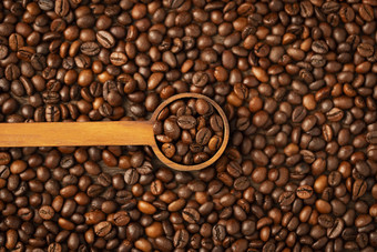 一勺咖啡豆咖啡创意背景
