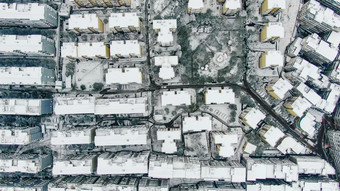 航拍城市住宅小区冬天雪景