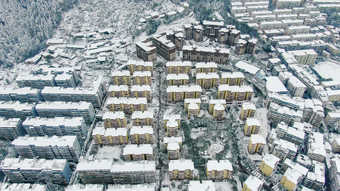 航拍城市住宅小区冬天雪景