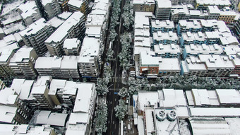 航拍城市住宅小区冬天雪景