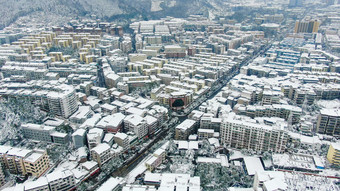 航拍城市住宅小区冬天雪景