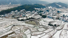 航拍美丽乡村冬天雪景