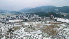 航拍美丽乡村农田雪景