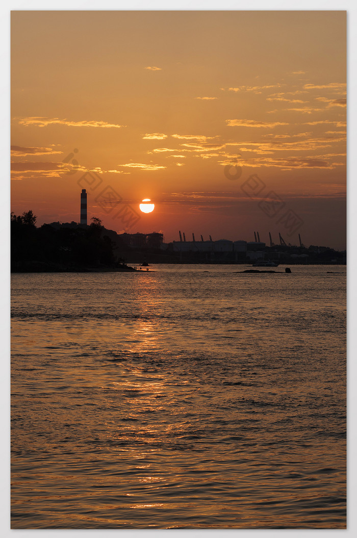 海边城市晚霞日落摄影图片图片