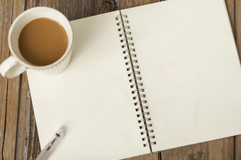 咖啡与笔记本<strong>学习</strong>办公木桌背景