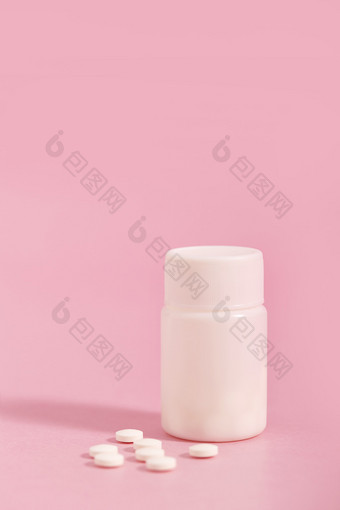 药品药瓶创意粉色背景