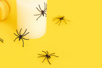 蜘蛛与蜡烛创意万圣节黄色图片