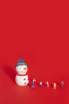 雪人微缩创意圣诞节红色海报