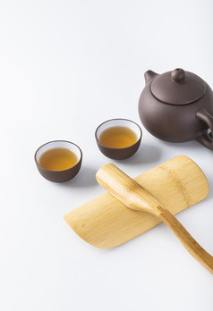 茶杯和茶叶茶具摄影图