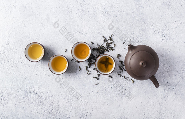 茶杯和茶叶茶具摄影图