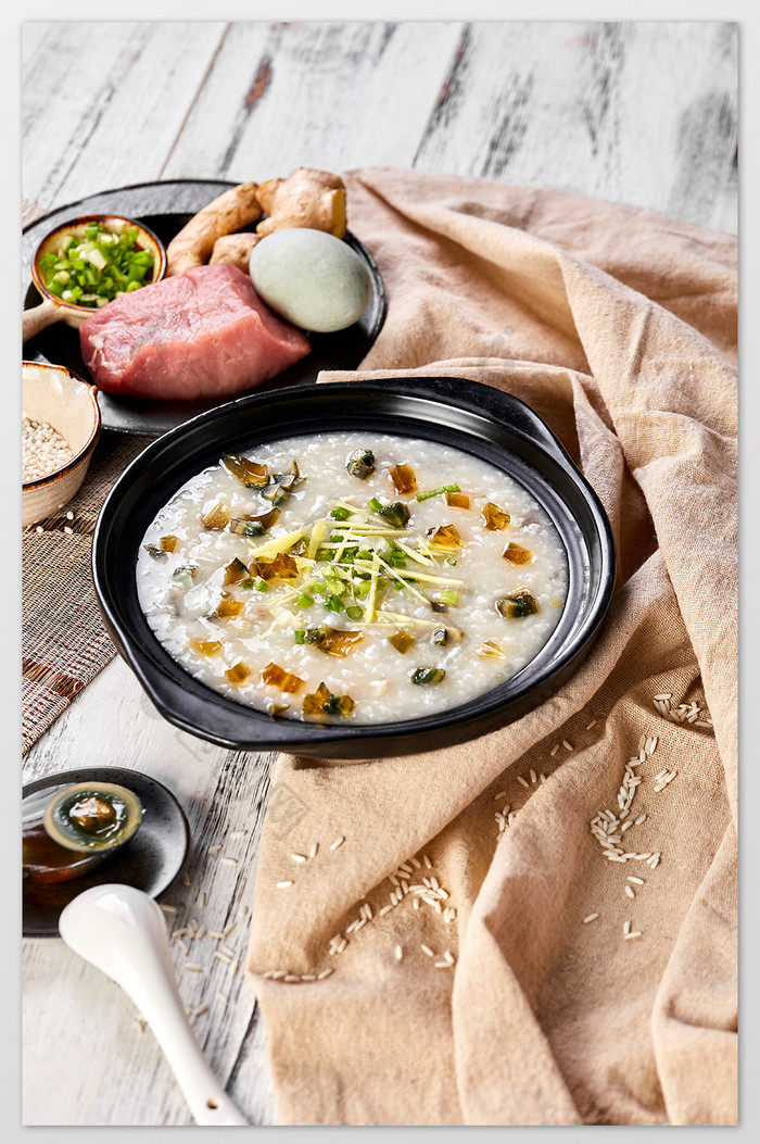 皮蛋瘦肉粥砂锅暖色白色传统美食摄影图片图片