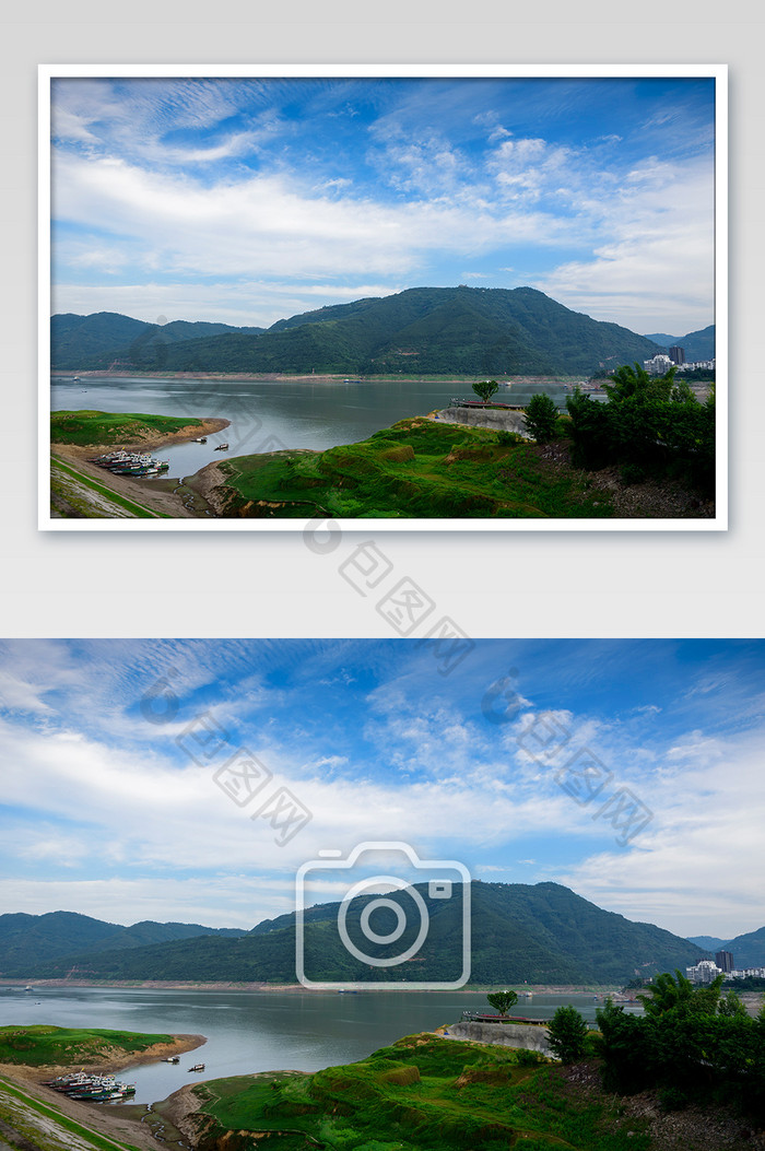 蓝天绿草地映衬下的长江摄影图片