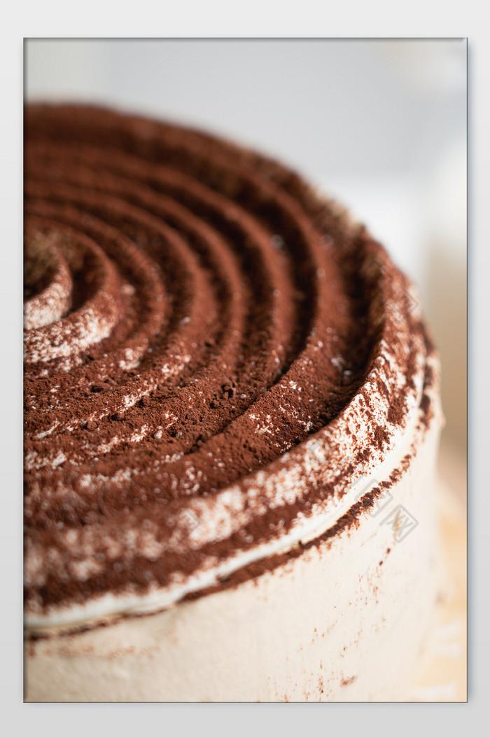 提拉米苏千层蛋糕表面细节摄影图