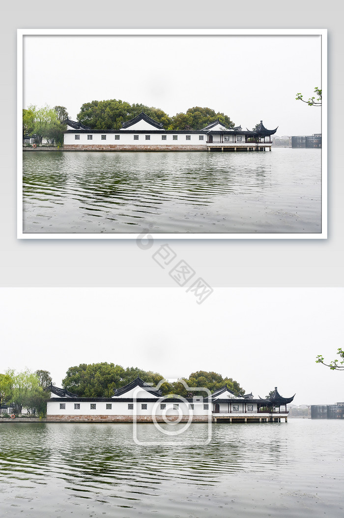 水面上的白墙黑瓦复古建筑摄影图片