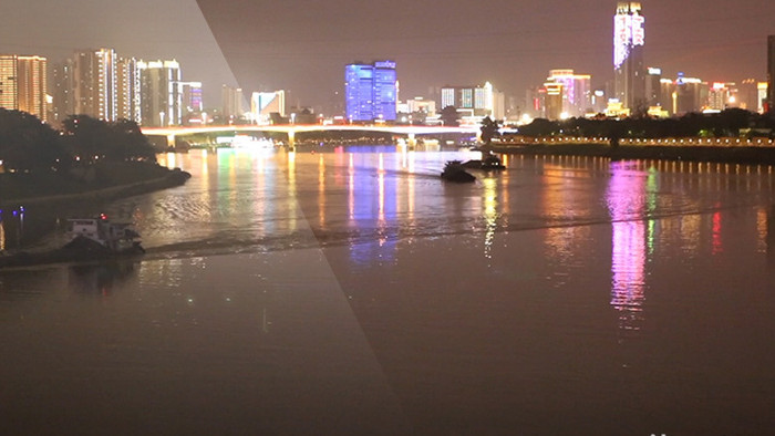 南宁邕江北大桥的风景与夜晚巡逻的船支